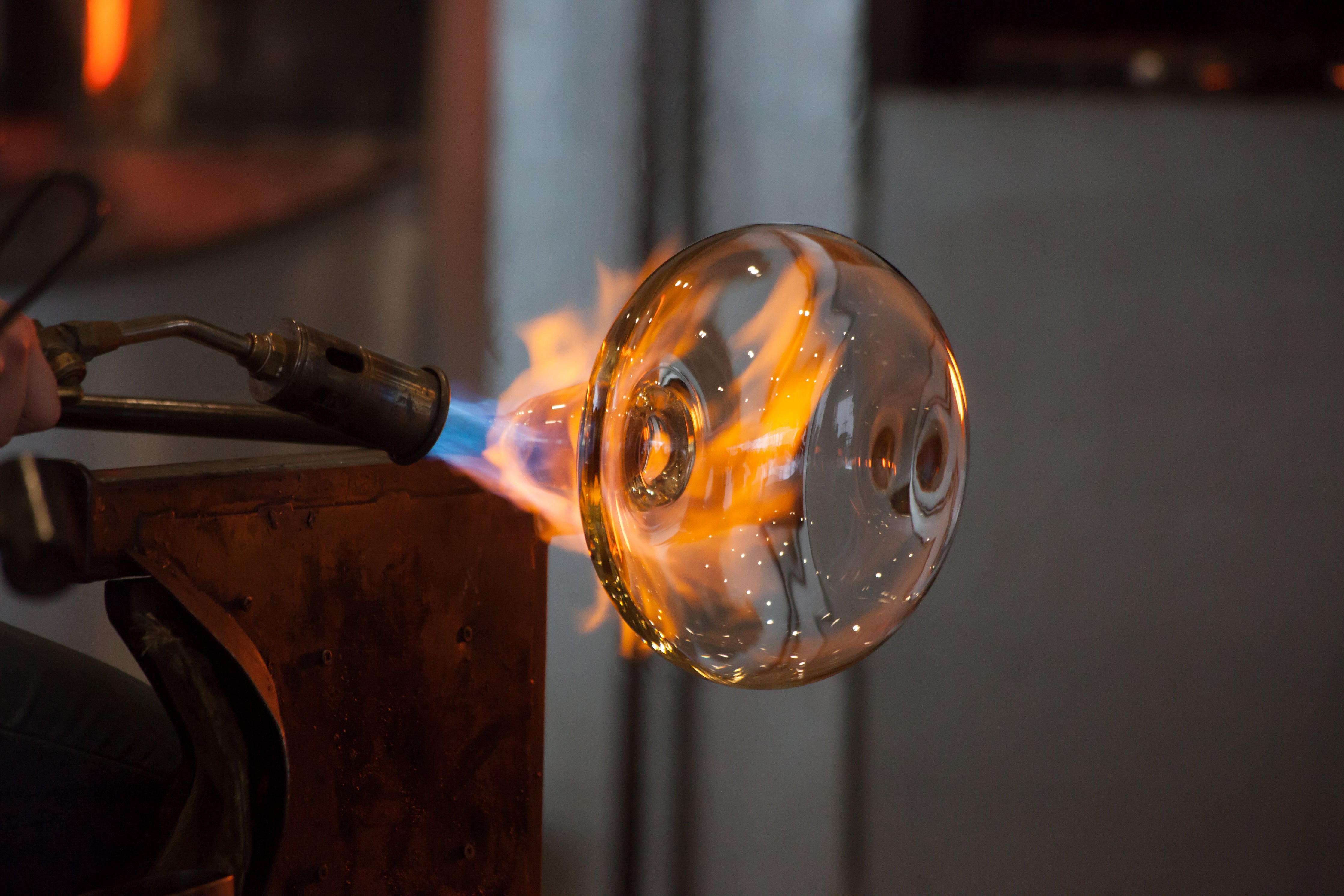 glass shaped into handmade decanter using fire