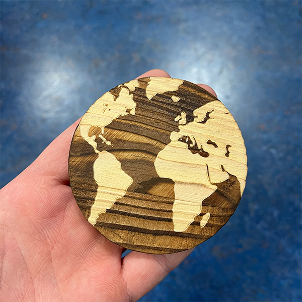 globe_wooden_coaster_in_hand