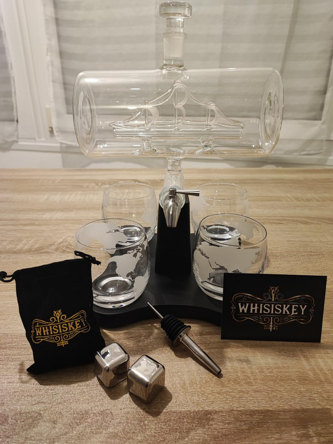 sailing_boat_decanter_on_table_with_accessories_whisiskey
