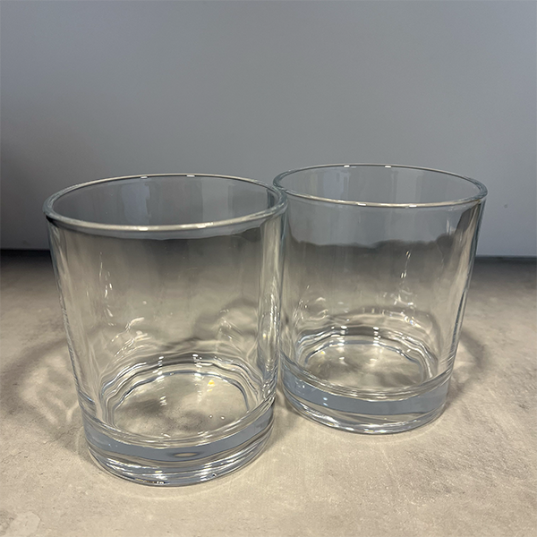 two_plain_tumblers_on_table
