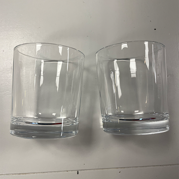 two_plain_whiskey_tumblers_on_table