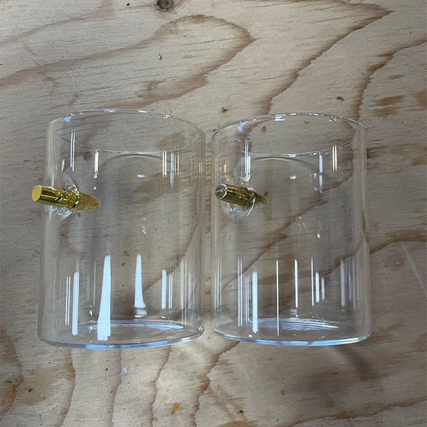 whiskey_tumblers_with_bullet_in_glass
