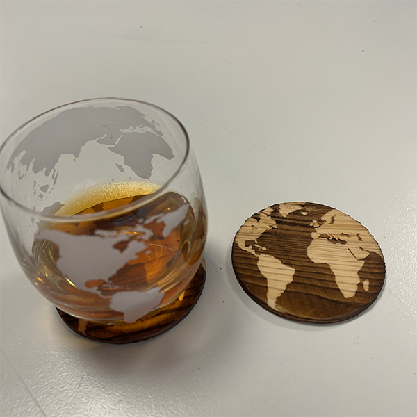 globe_coaster_with_a_globe_glass_with_whiskey_inside