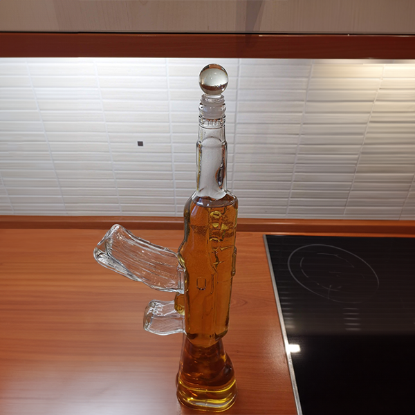 rifle_ak47_decanter_standing_on_kitchen_counter_with_whiskey