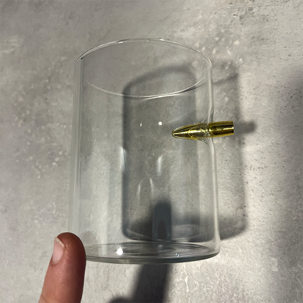 straight_bullet_whiskey_glass_on_table